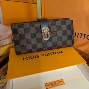 Louis Vuitton Brown Clutch with Gold Accents